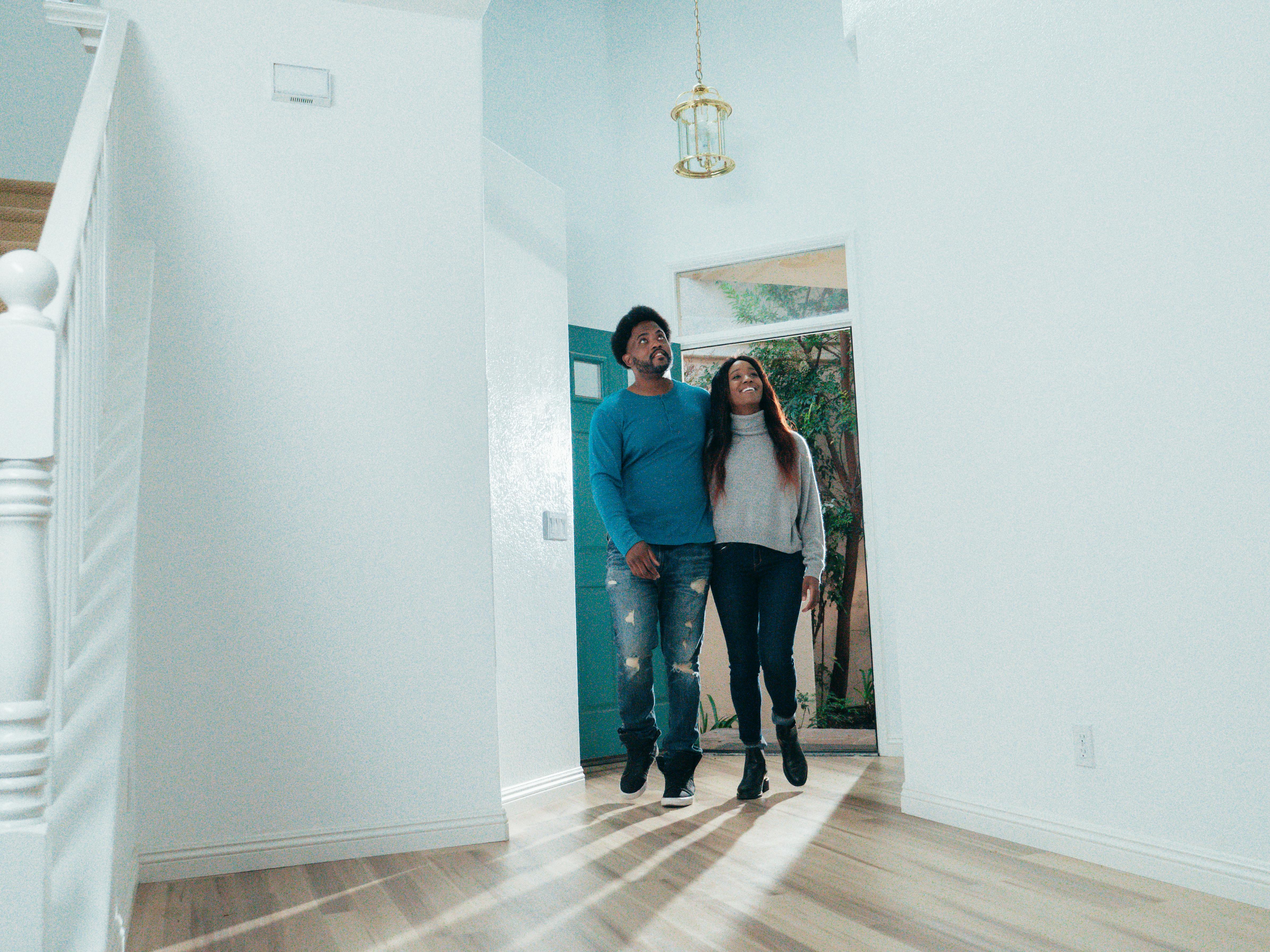 Couple viewing new home interior