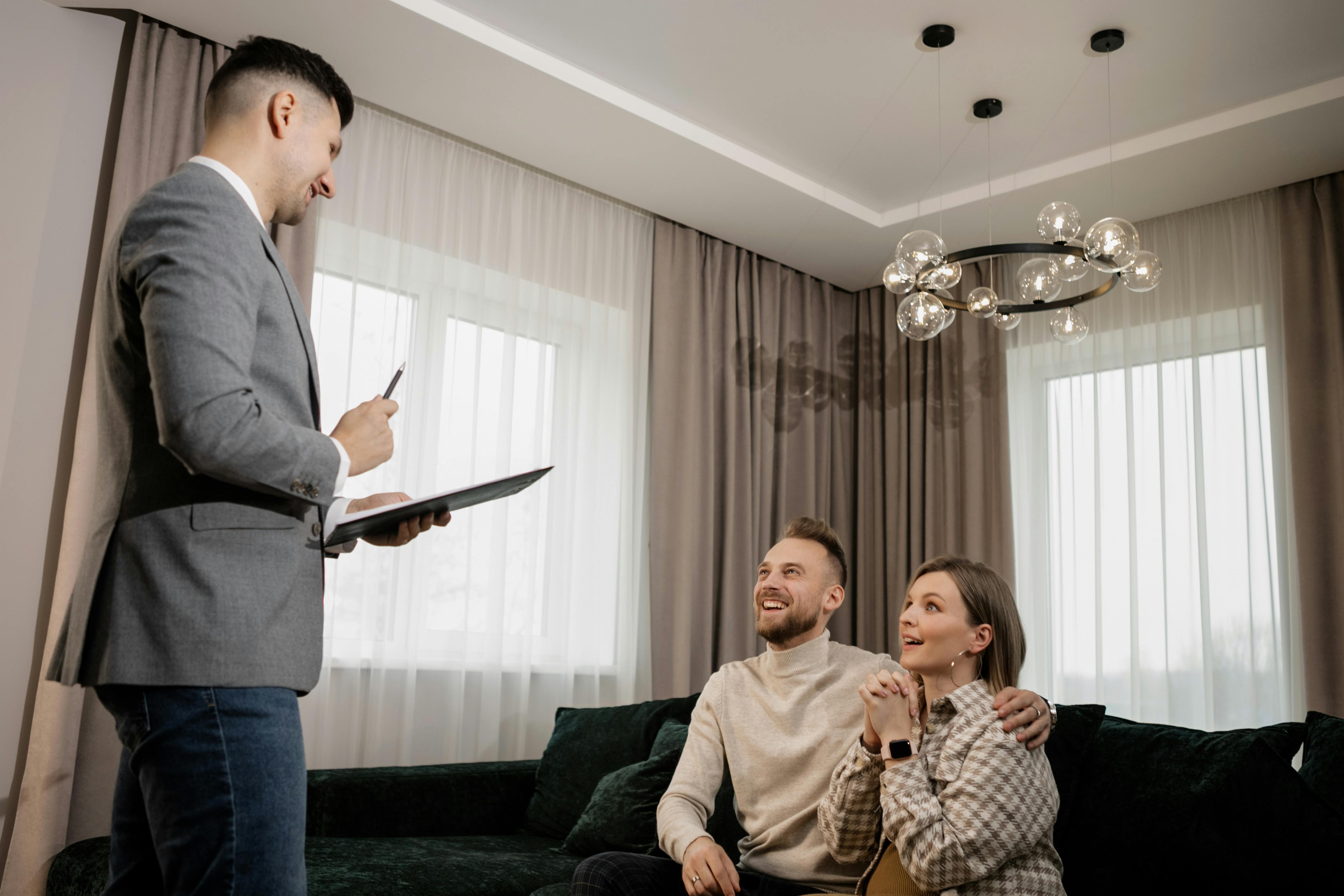 Couple Meeting with Real Estate Agent