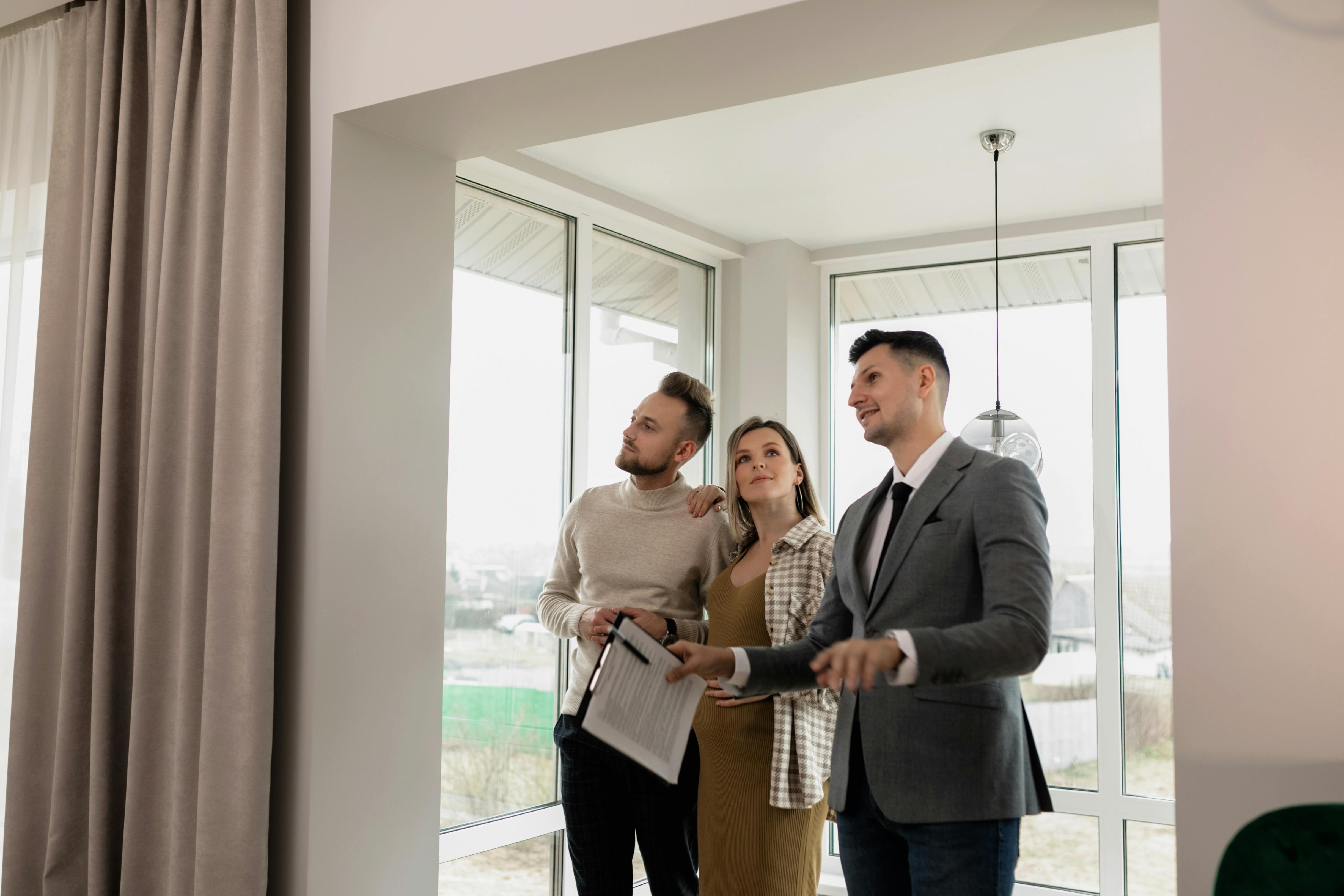 Real estate agent showing a modern home