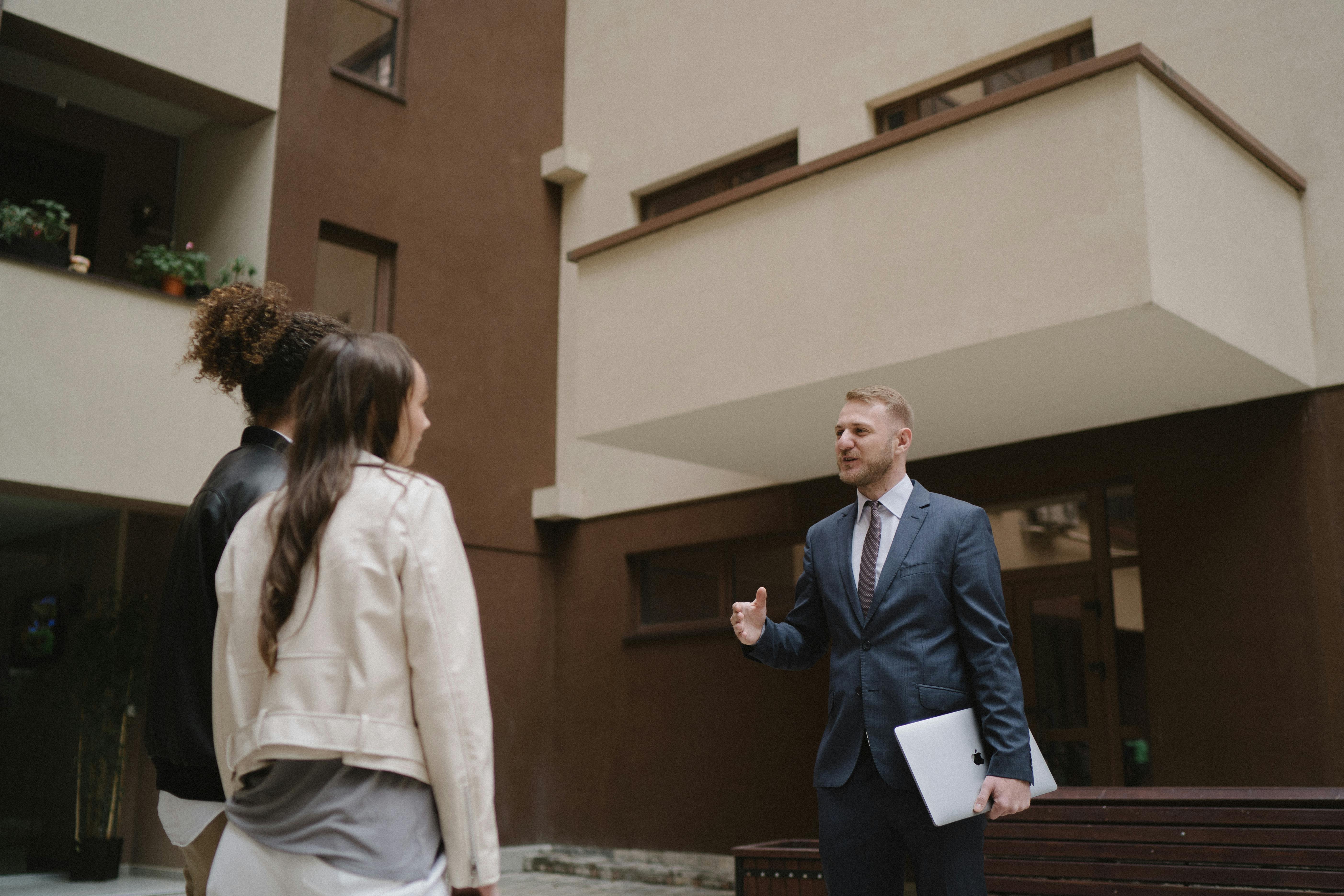 Real Estate Agent Showing Apartment