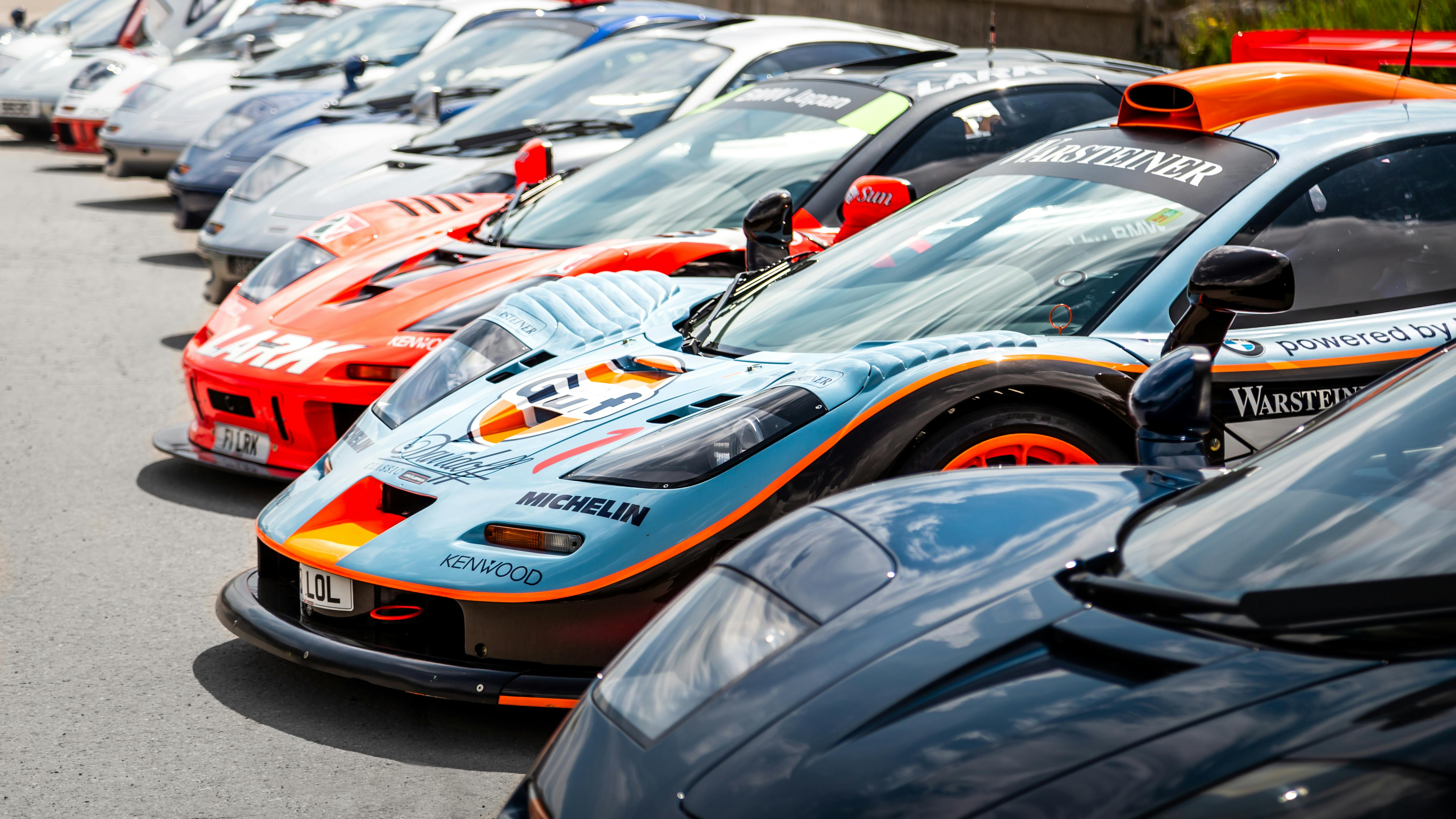 Lineup of classic and supercars