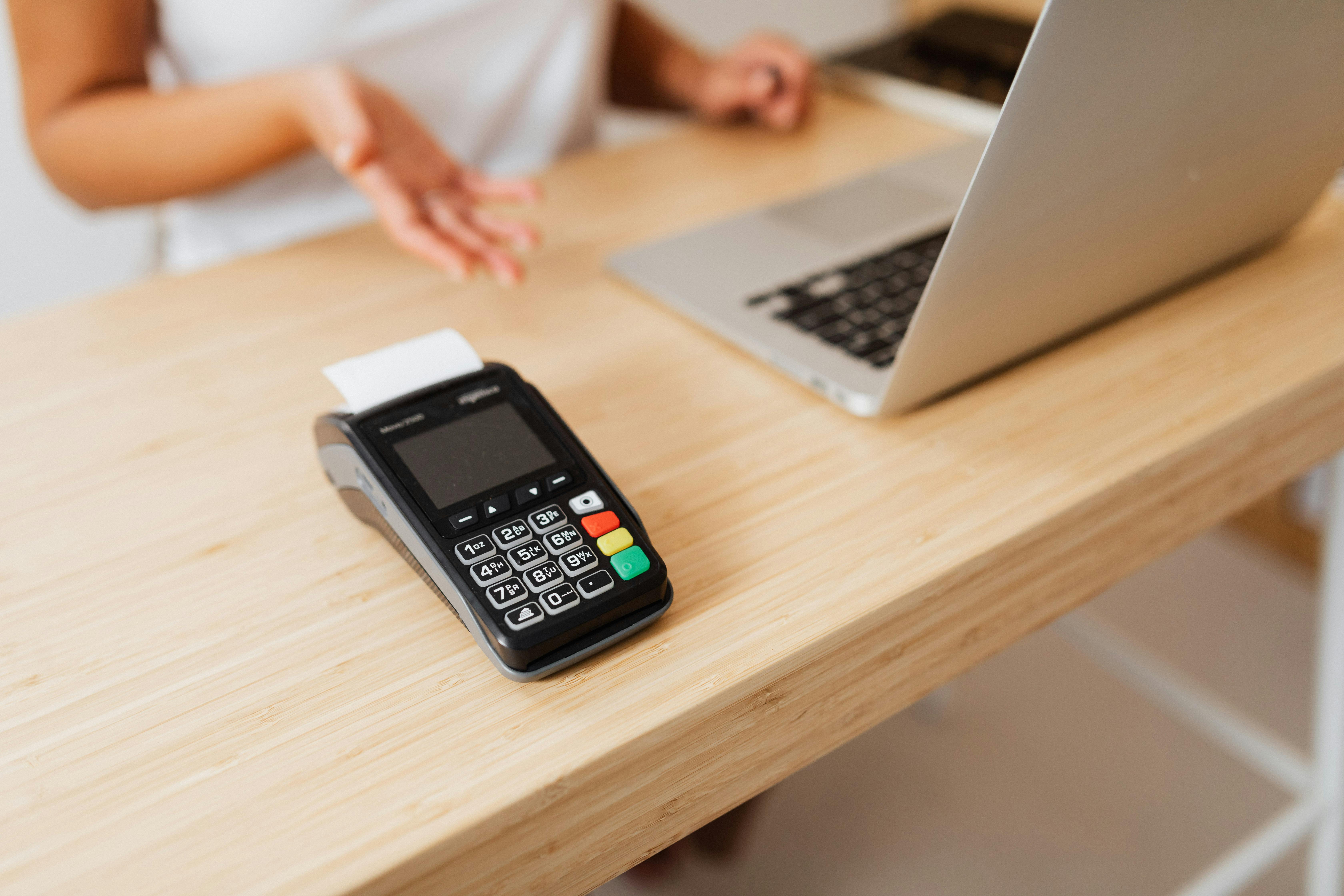 Card reader on a wooden desk