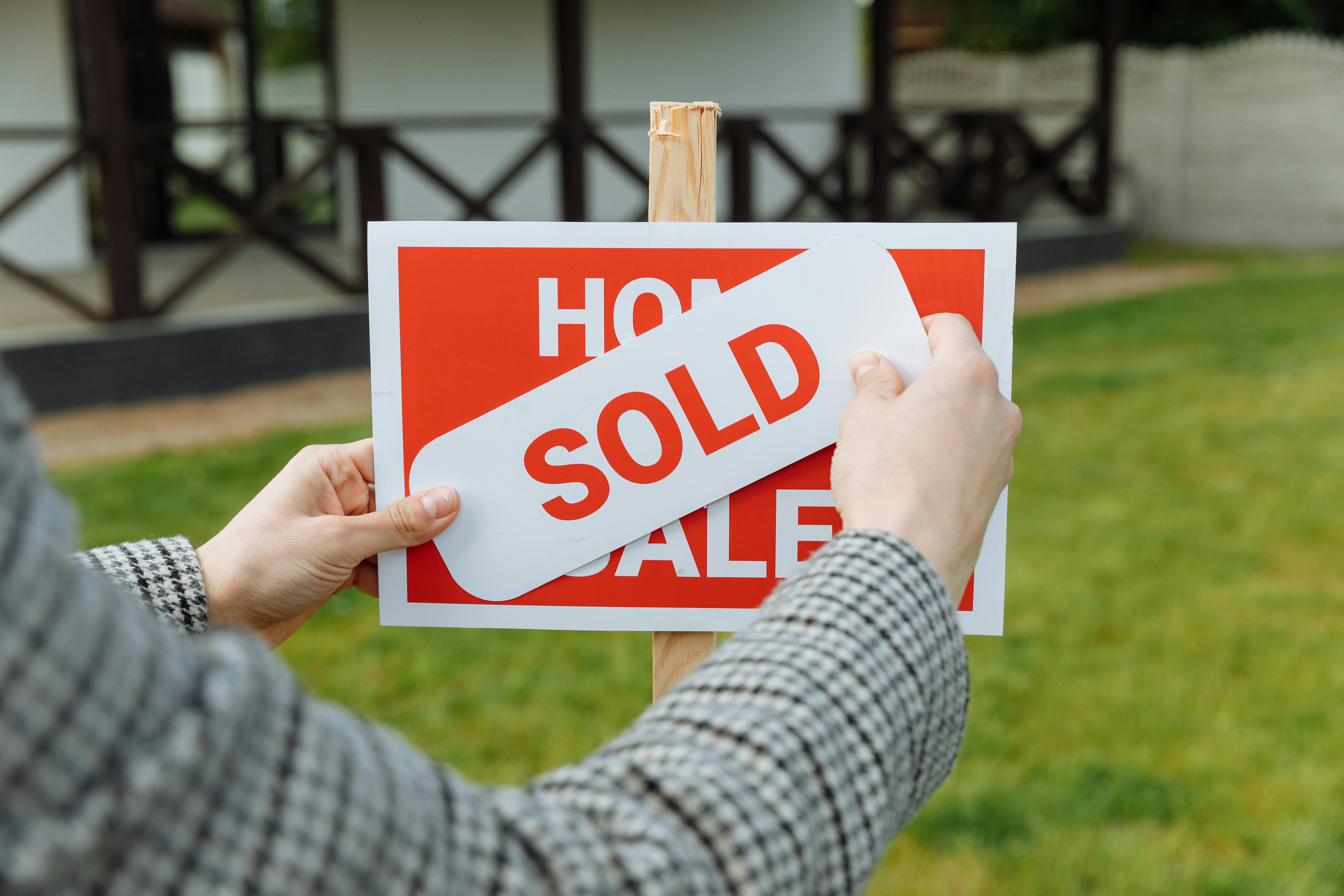 Sold Sticker on Real Estate Sign