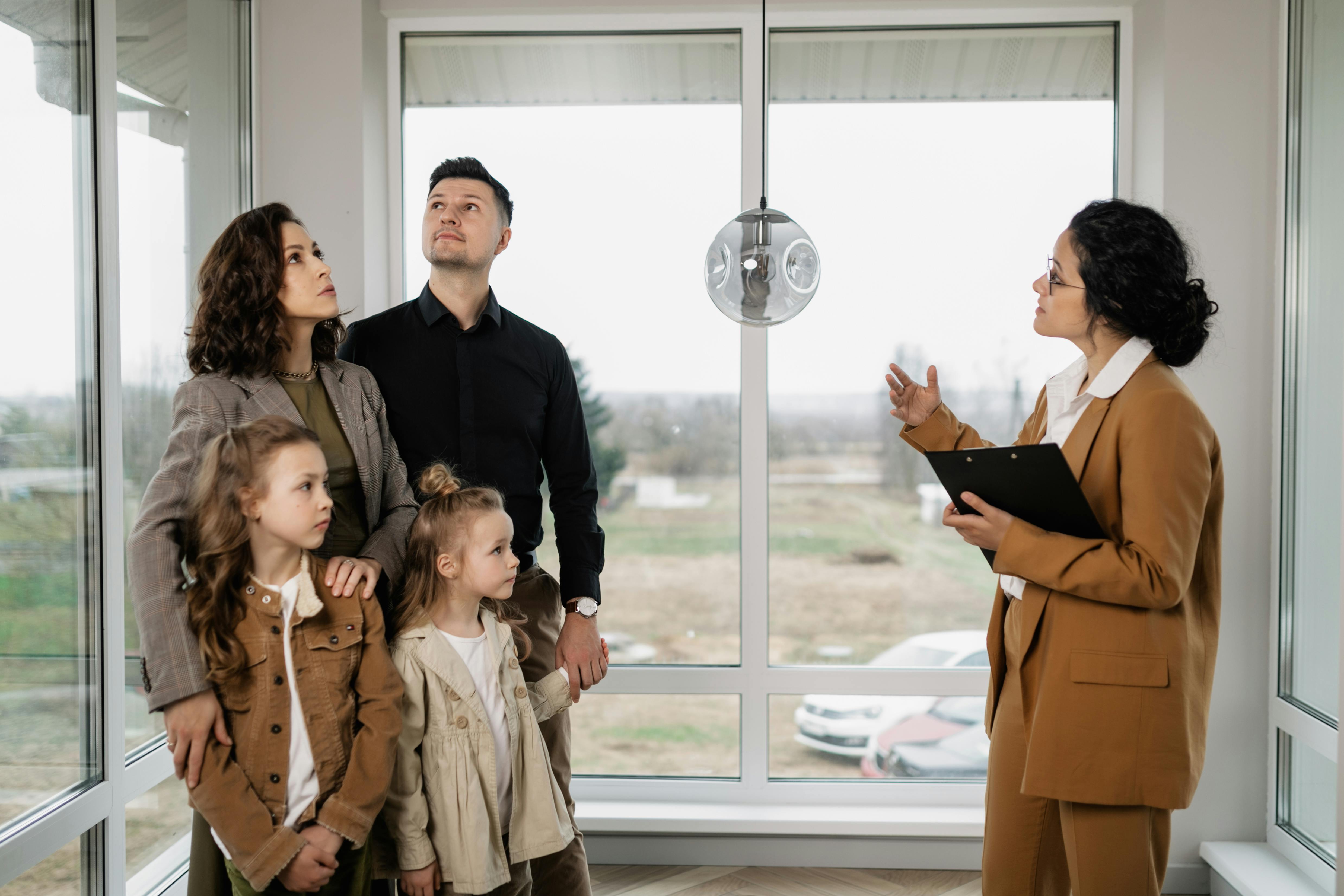 Family with children visiting a potential new home