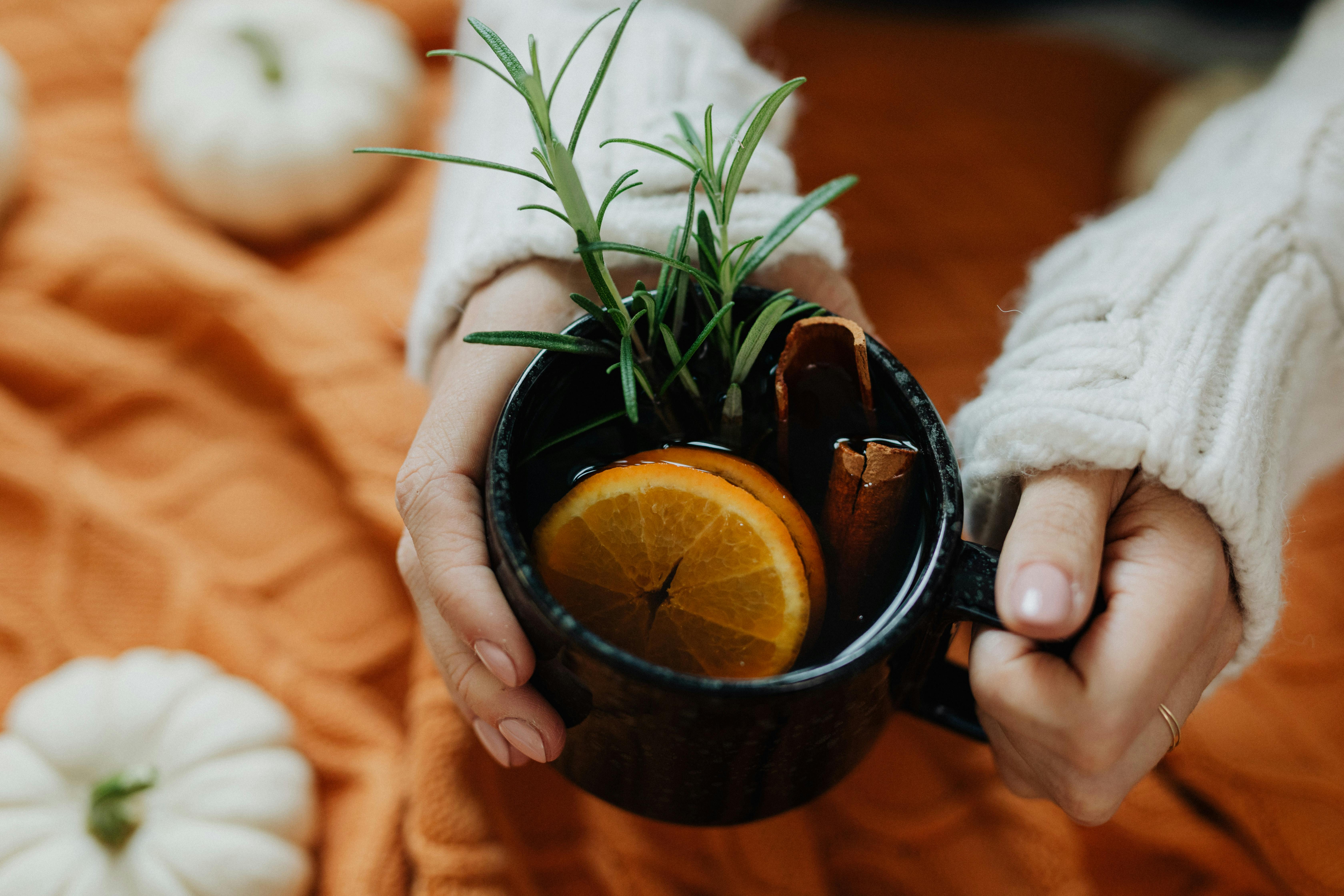 Hands holding a warm cup