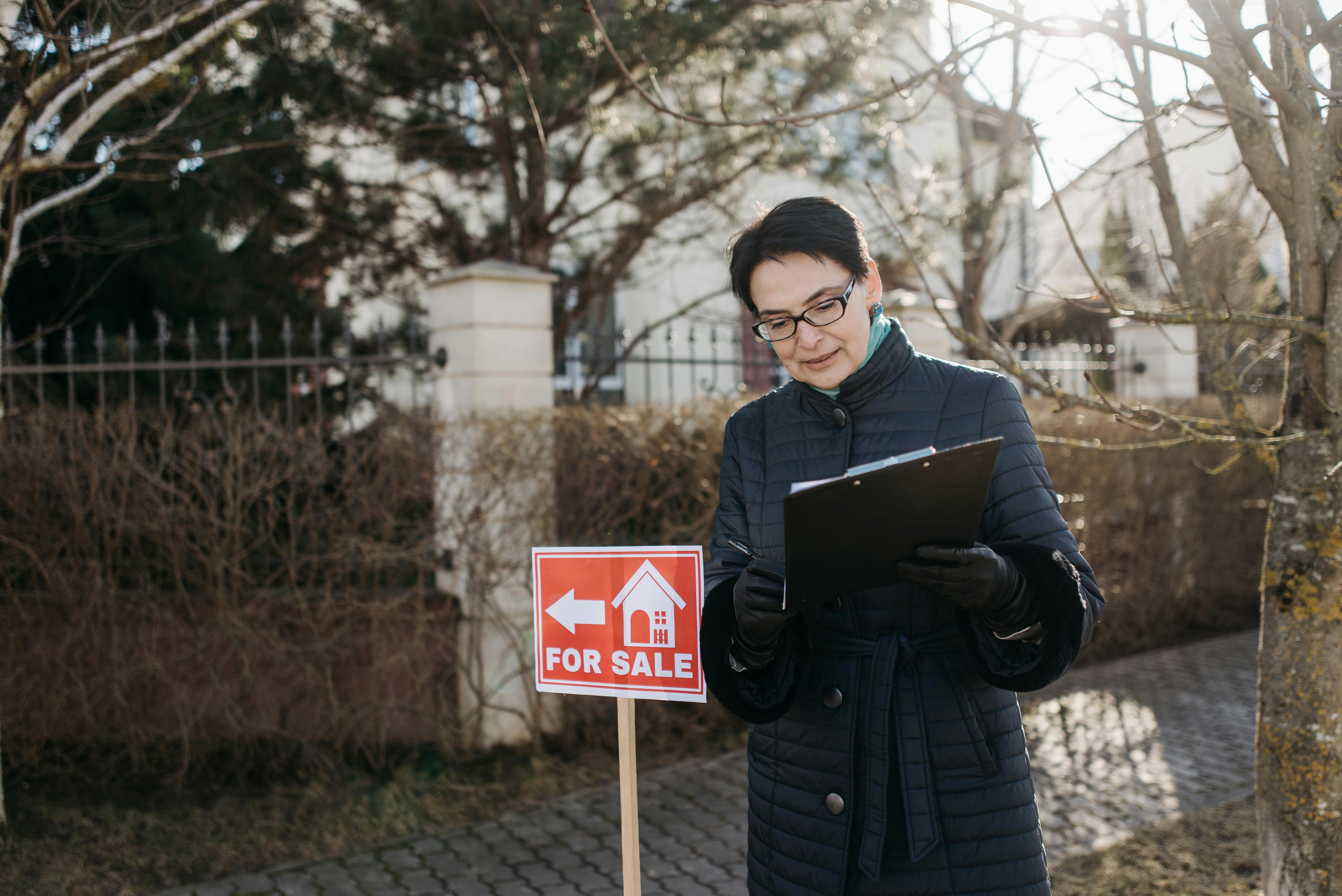 Real Estate Agent Inspecting House