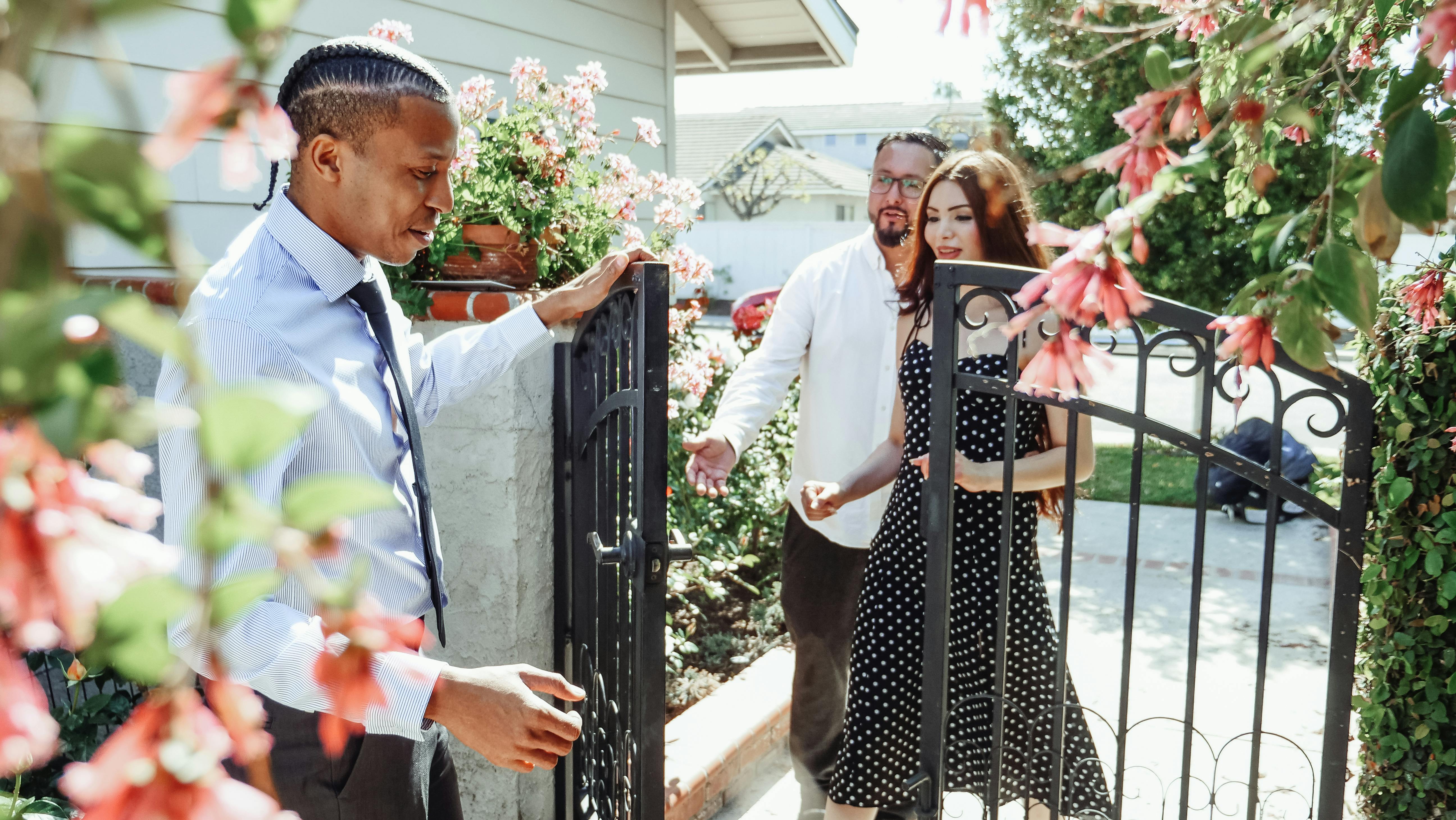 Realtor welcoming a couple